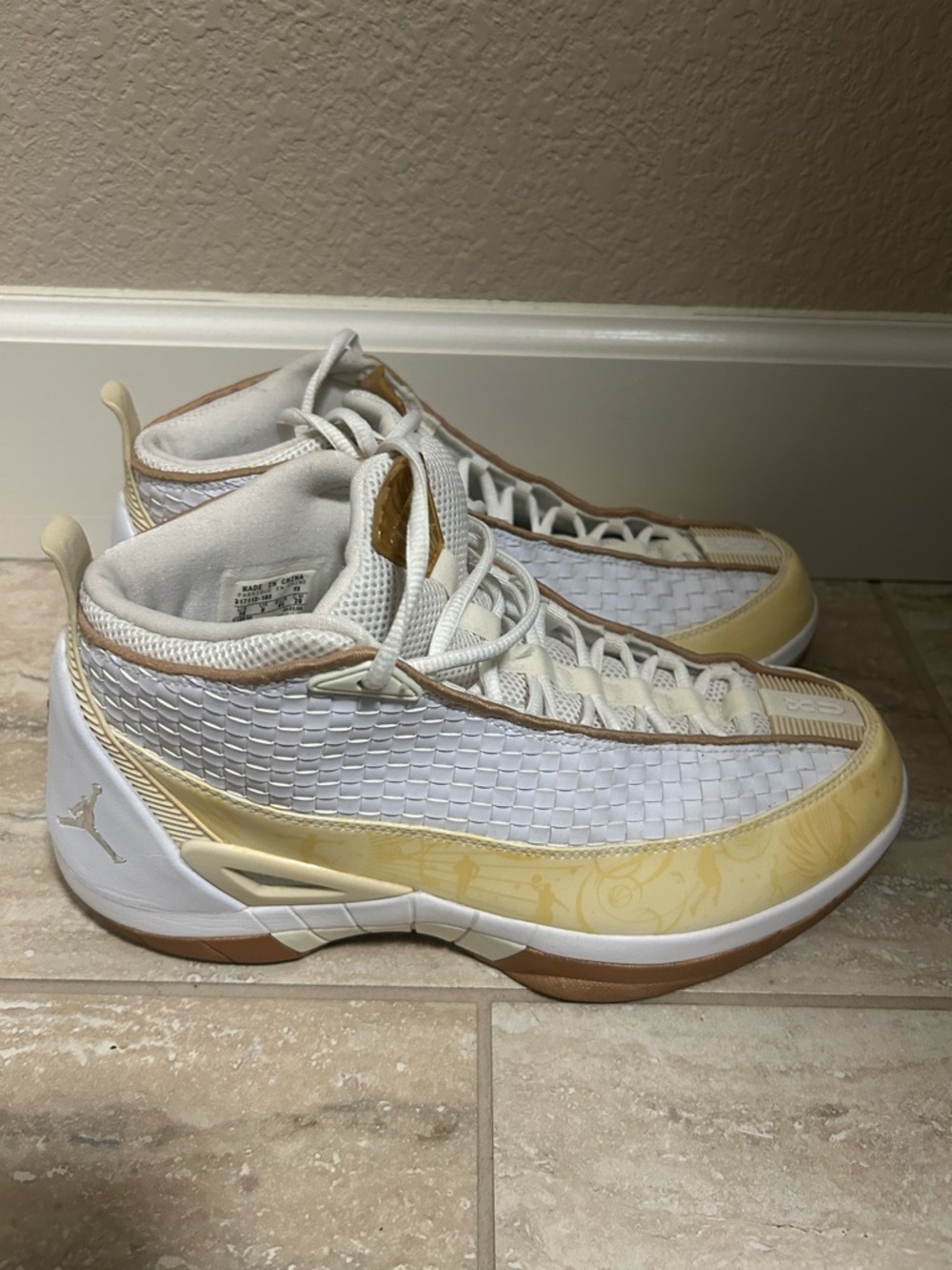 Jordan White and Gold Woven High-Top Sneakers